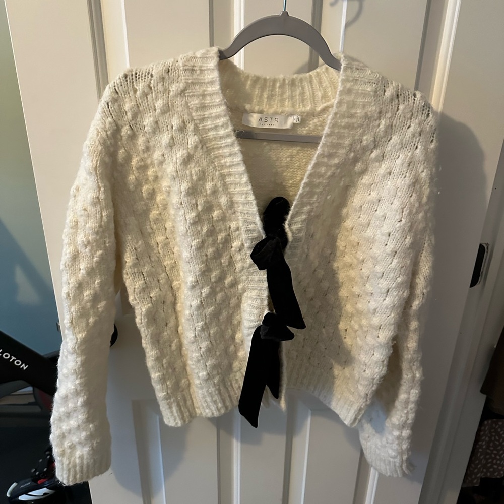 ASTR Cream sweater with Black bows down the front